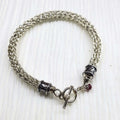 Handmade 10mm silver Viking knit bracelet with Ruby charm