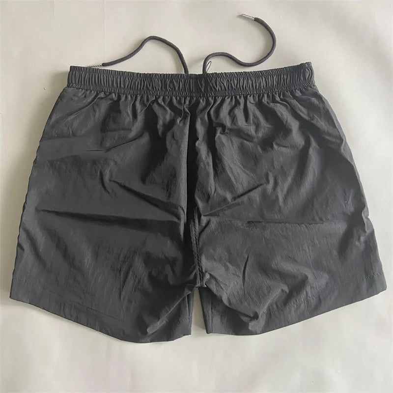 Top quality luxury knee-length  summer youth leisure sports nylon shorts loose men's beach 5-point pants