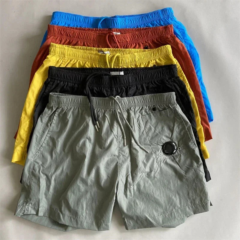 Top quality luxury knee-length  summer youth leisure sports nylon shorts loose men's beach 5-point pants